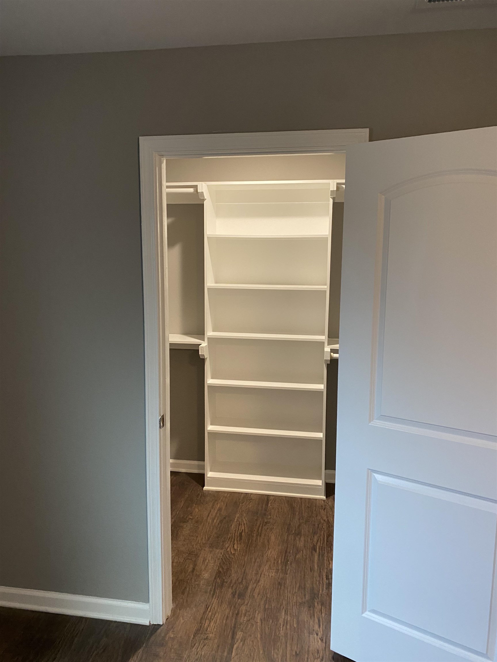 1729 Hanson Road Memphis, TN 38108 - Photo 12 of 12 a view of walk in closet with empty racks
