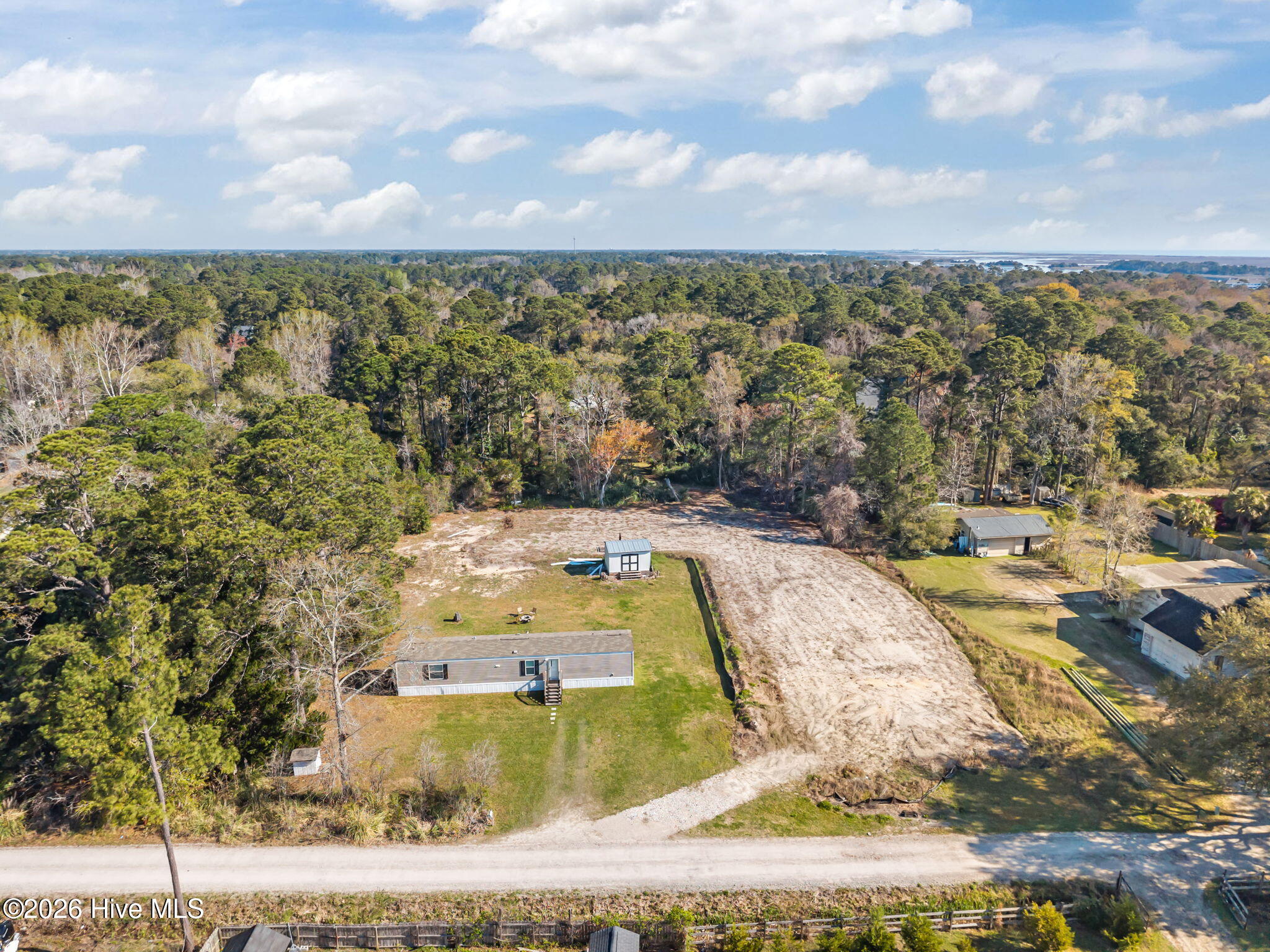 1633 Kennedy Road Wilmington, NC 28409 - Photo 2 of 13 19-web-or-mls-DJI_20260320101508_0657_D