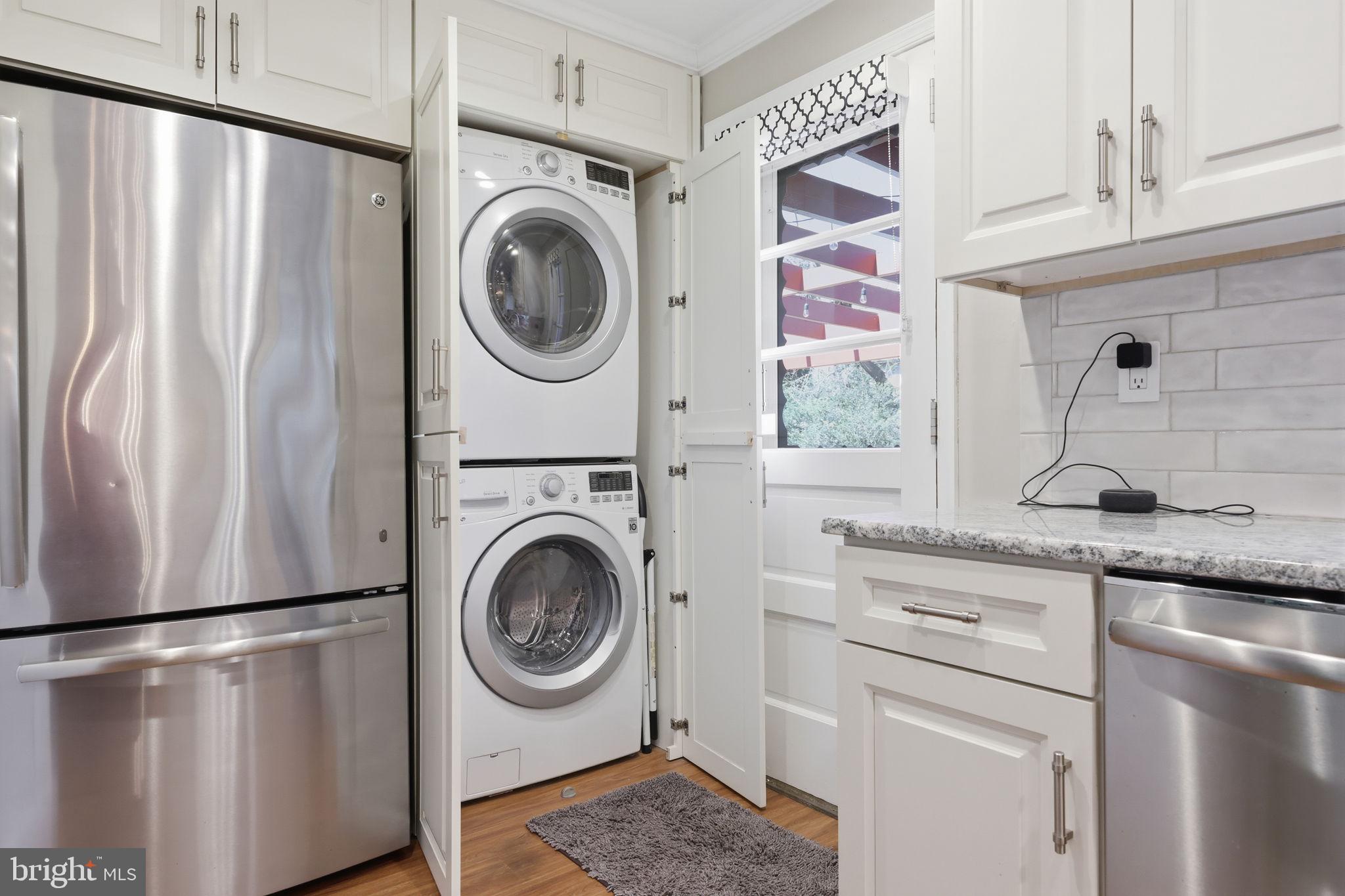 3868 Blake Road Huntingdon Valley, PA 19006 - Photo 17 of 50 a kitchen with a washer and dryer