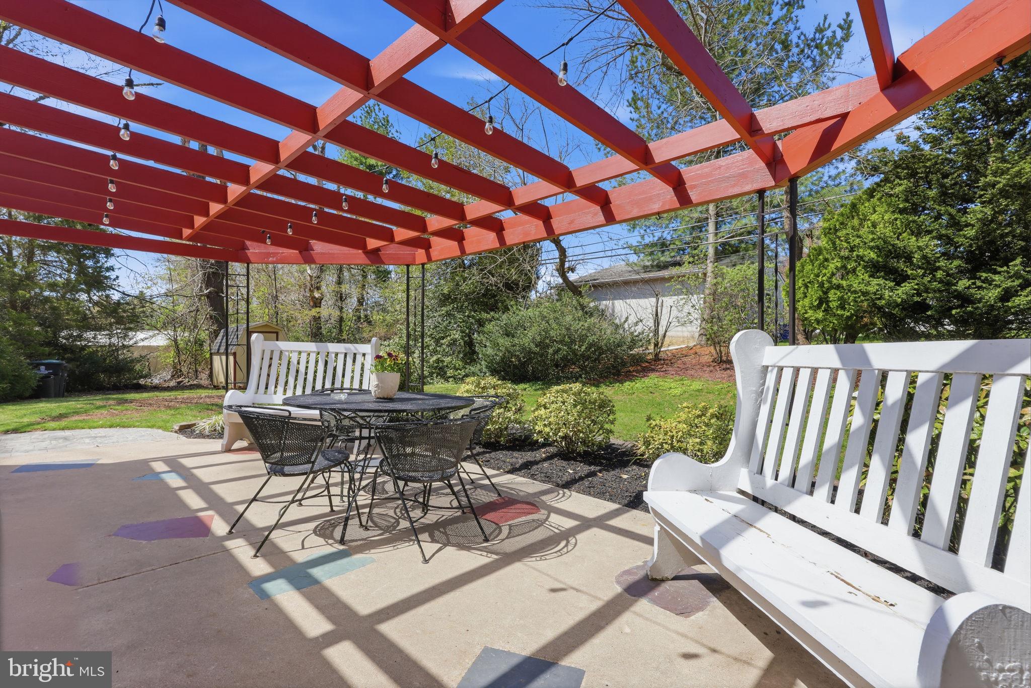 3868 Blake Road Huntingdon Valley, PA 19006 - Photo 37 of 50 a view of a patio with a table and chairs