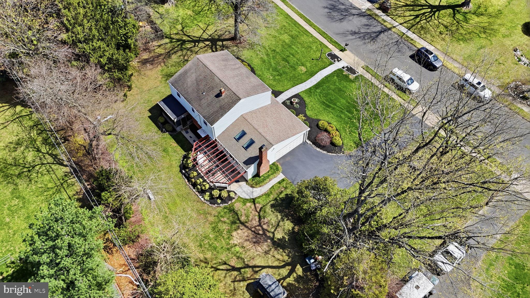 3868 Blake Road Huntingdon Valley, PA 19006 - Photo 48 of 50 an aerial view of a house with garden space and a lake view