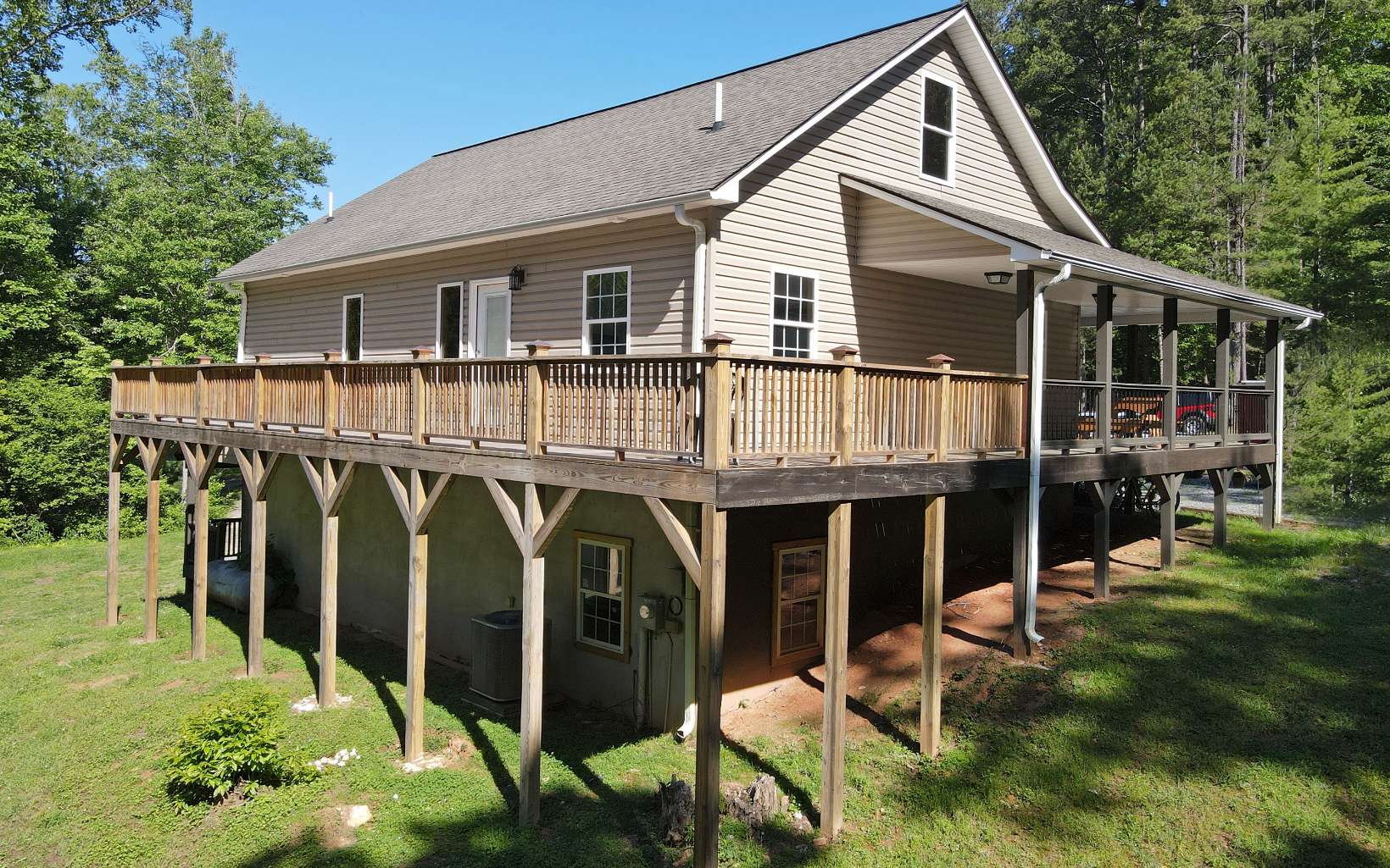 110 Goldfinch Lane Murphy, NC 28906 - Photo 33 of 36 a backyard of a house with wooden floor and fence