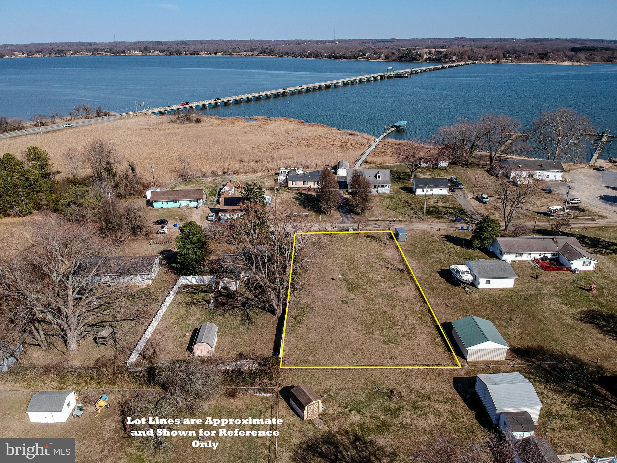 an aerial view of a house with a lake view