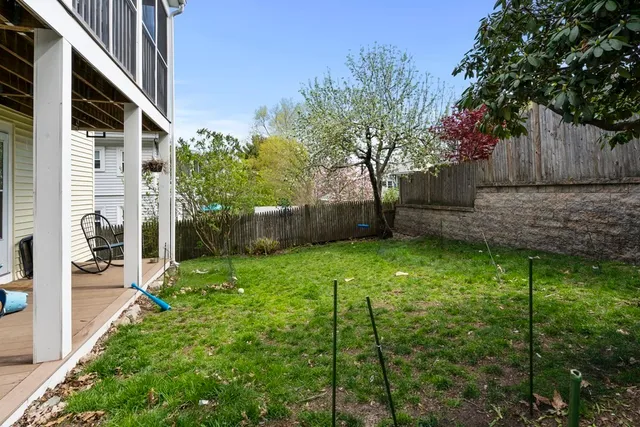 a backyard of a house with lots of green space