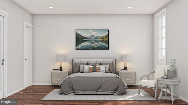 a bedroom with a bed and a chair