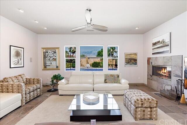 69707 Camino Pacifico Rancho Mirage, CA 92270 - Photo 4 of 38 a living room with furniture and a window
