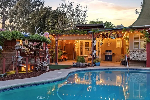 a view of a swimming pool with a porch