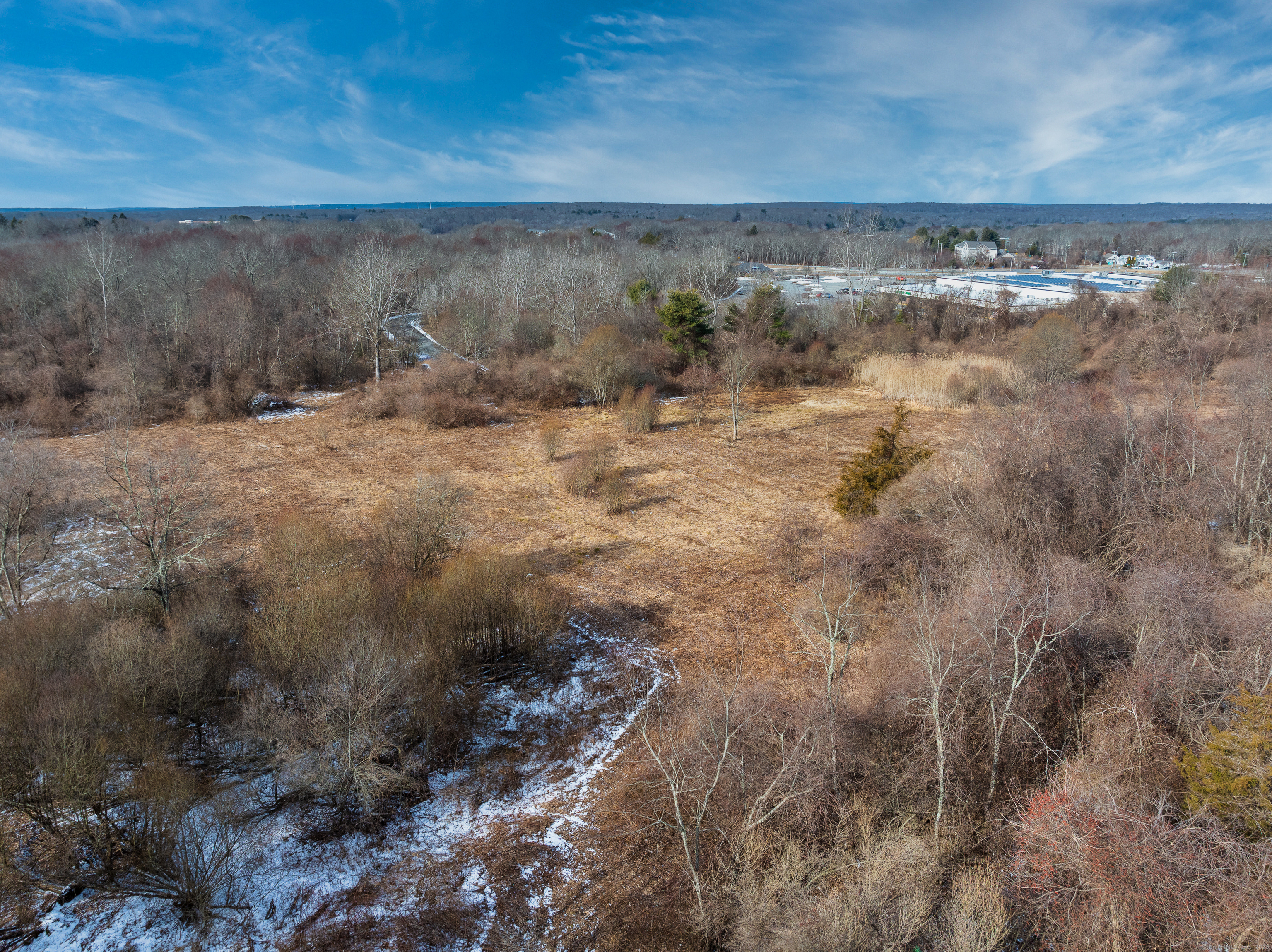 523 Voluntown Road Griswold, CT 06351 - Photo 13 of 16 a view of a lake with a mountain in the back
