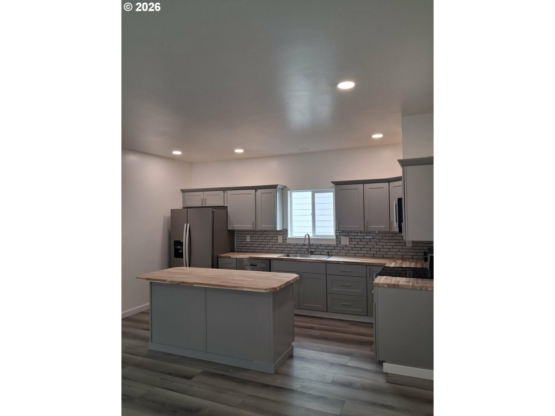2008 True Loop La Grande, OR 97850 - Photo 4 of 16 a kitchen with a sink cabinets and stainless steel appliances