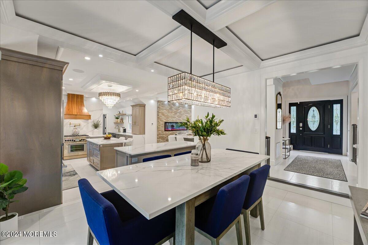 32 Devonshire Drive Morganville, NJ 07751 - Photo 13 of 53 a view of a dining room with furniture and wooden floor