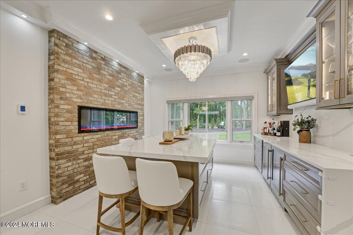 32 Devonshire Drive Morganville, NJ 07751 - Photo 21 of 53 a view of a dining room with furniture window and wooden floor