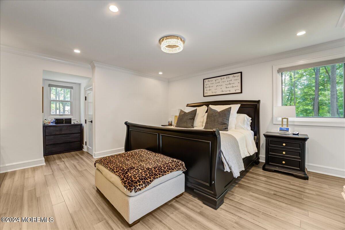 32 Devonshire Drive Morganville, NJ 07751 - Photo 26 of 53 a bedroom with a bed and a night stand