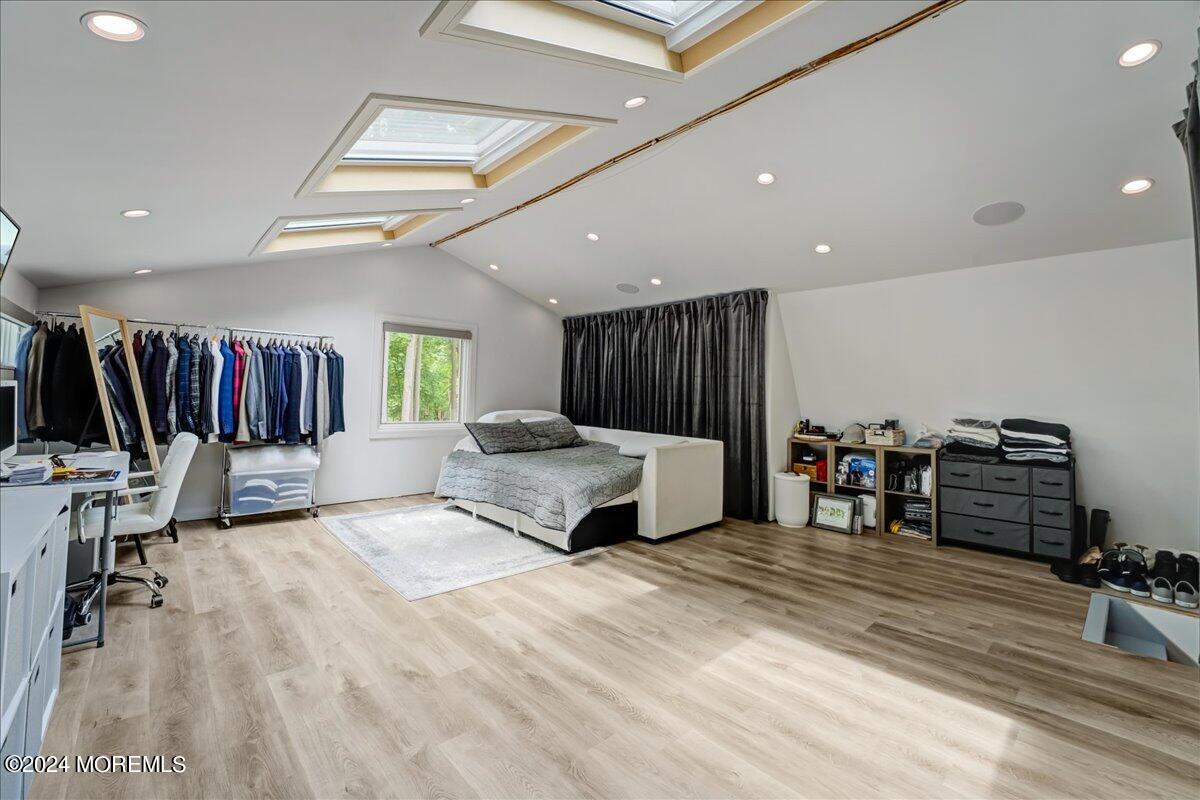 32 Devonshire Drive Morganville, NJ 07751 - Photo 34 of 53 a living room with furniture a air conditioner vent and a window