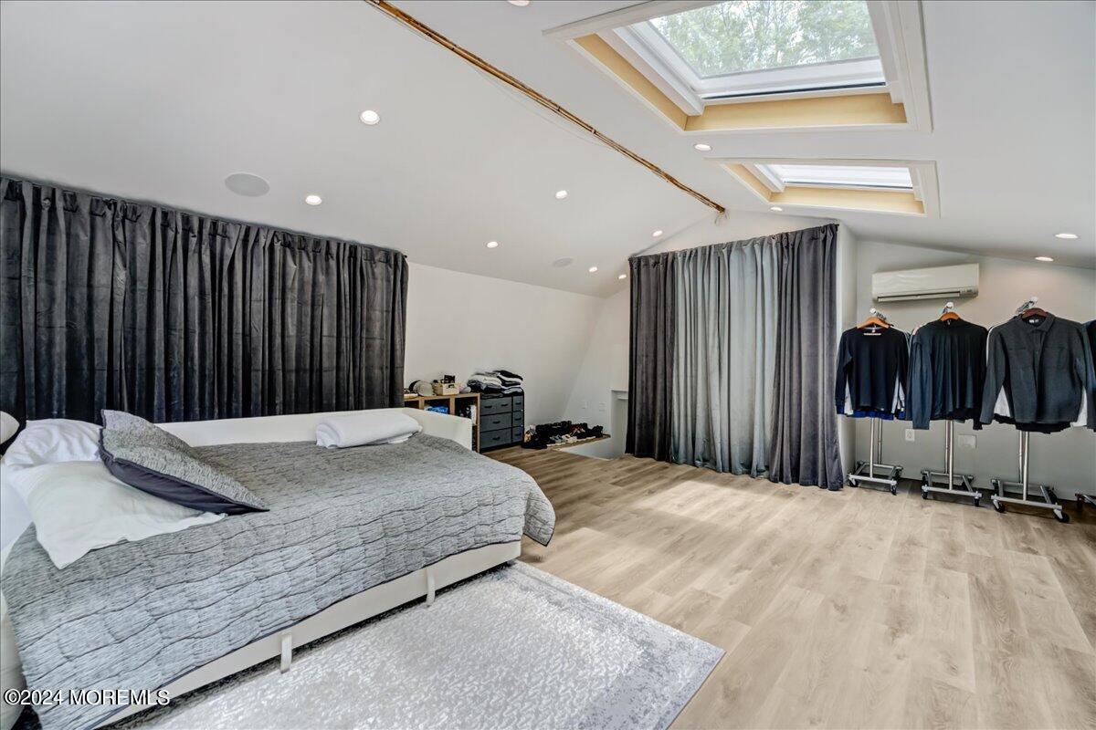 32 Devonshire Drive Morganville, NJ 07751 - Photo 35 of 53 a spacious bedroom with a bed and a dresser