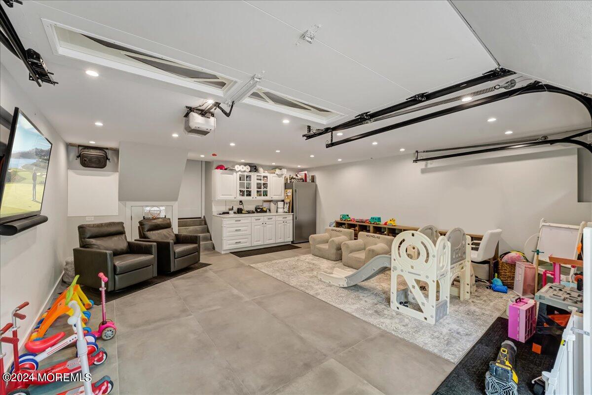 32 Devonshire Drive Morganville, NJ 07751 - Photo 36 of 53 a view of a room with gym equipment