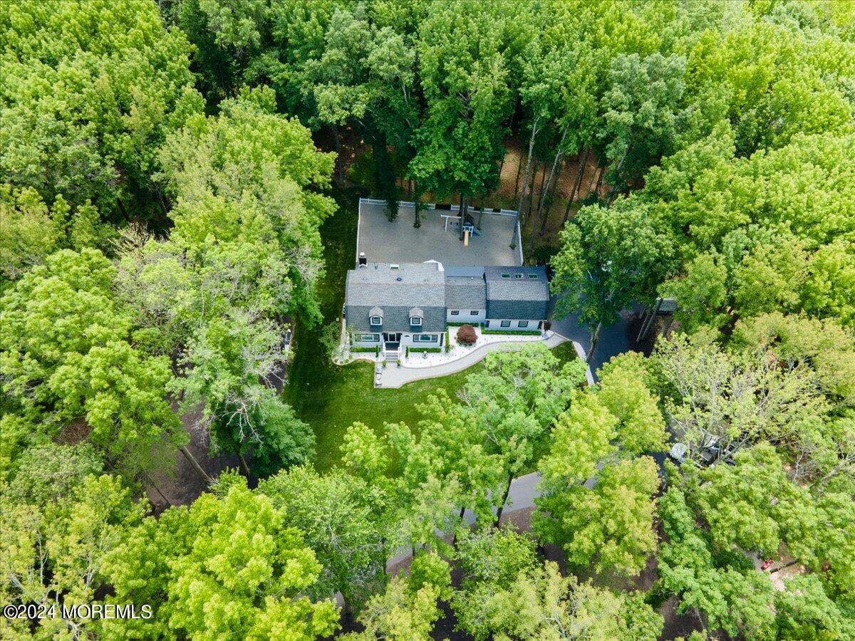 32 Devonshire Drive Morganville, NJ 07751 - Photo 45 of 53 an aerial view of a house with a yard