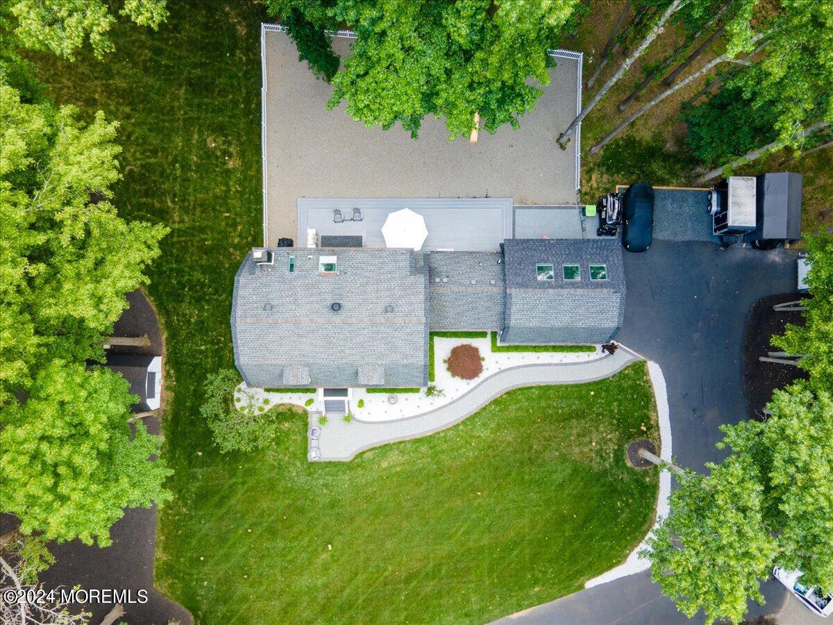 32 Devonshire Drive Morganville, NJ 07751 - Photo 46 of 53 an aerial view of a house with outdoor space