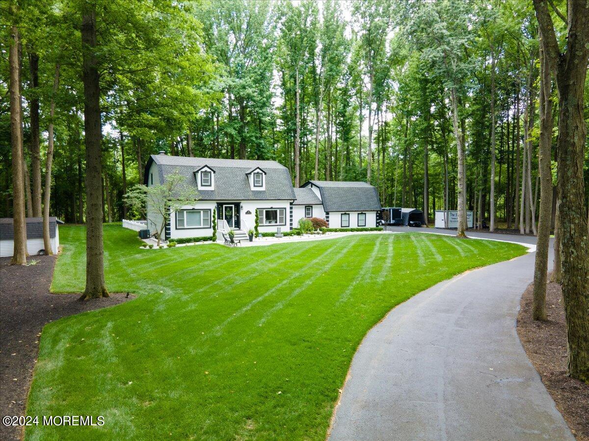 32 Devonshire Drive Morganville, NJ 07751 - Photo 50 of 53 a view of a house with a big yard