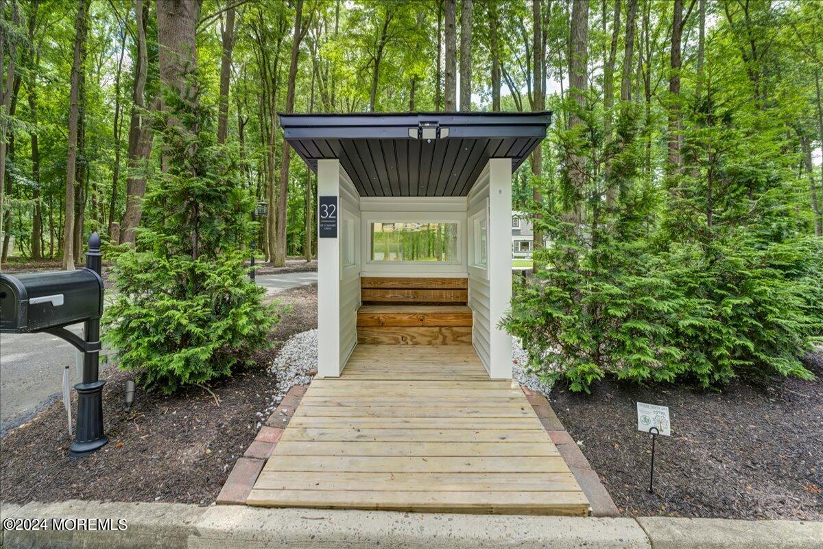 32 Devonshire Drive Morganville, NJ 07751 - Photo 6 of 53 a front view of a house with a yard