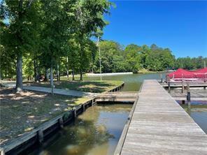 a view of swimming pool with a yard