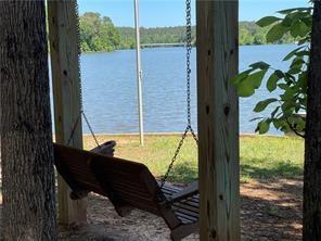 1111 Dockside Drive Buckhead, GA 30625 - Photo 3 of 15 a bath room with a large window and outside view