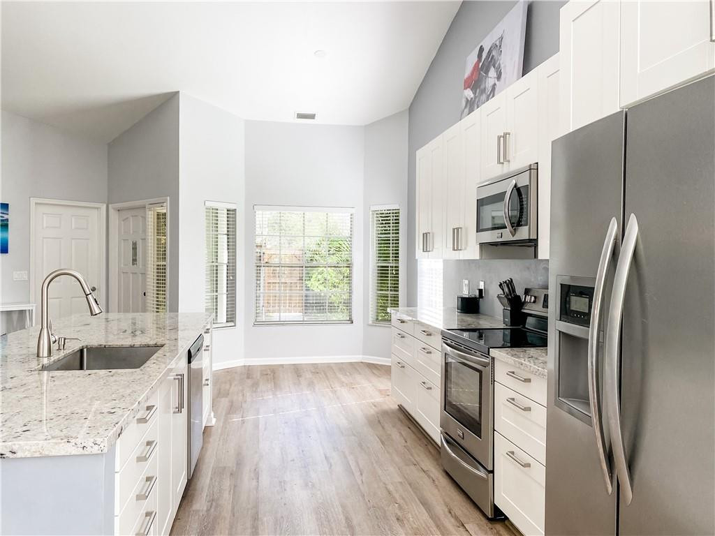 12655 Timber Ridge Circle Wellington, FL 33414 - Photo 5 of 28 Large kitchen with island