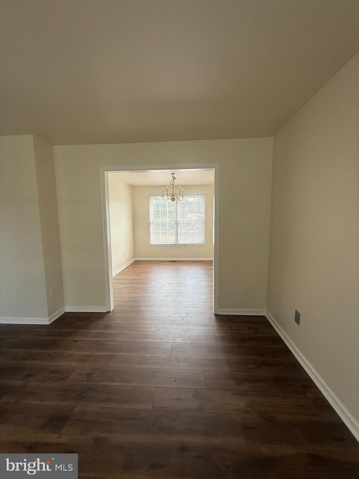 12549 Rock Ridge Road Herndon, VA 20170 - Photo 3 of 28 Living room looking into Dining