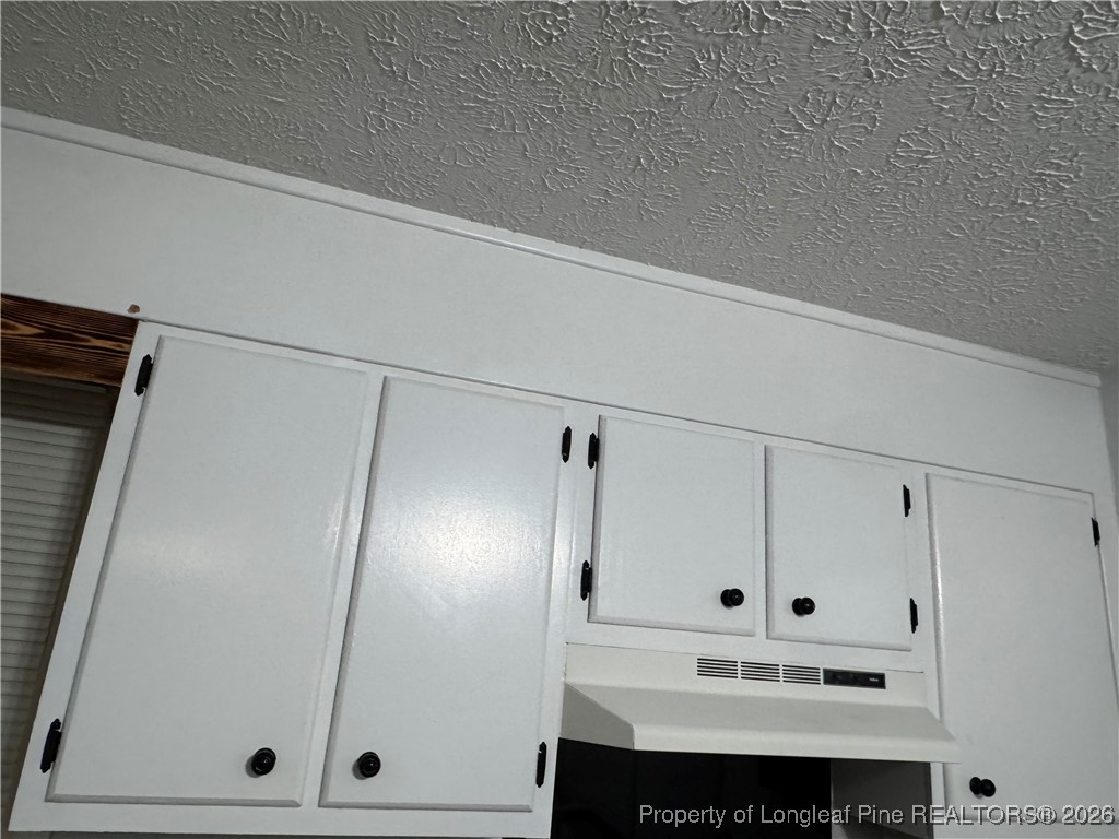 5733 Sagamore Road Hope Mills, NC 28348 - Photo 6 of 8 a view of cabinets