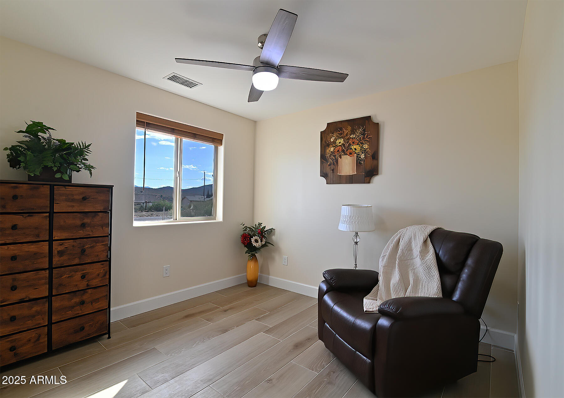 20214 East Mesa Verde Road Mayer, AZ 86333 - Photo 14 of 26 a living room with furniture and a window