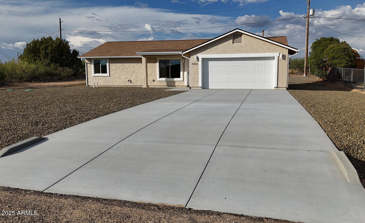 20214 East Mesa Verde Road Mayer, AZ 86333 - Photo 19 of 26 a front view of a house with yard