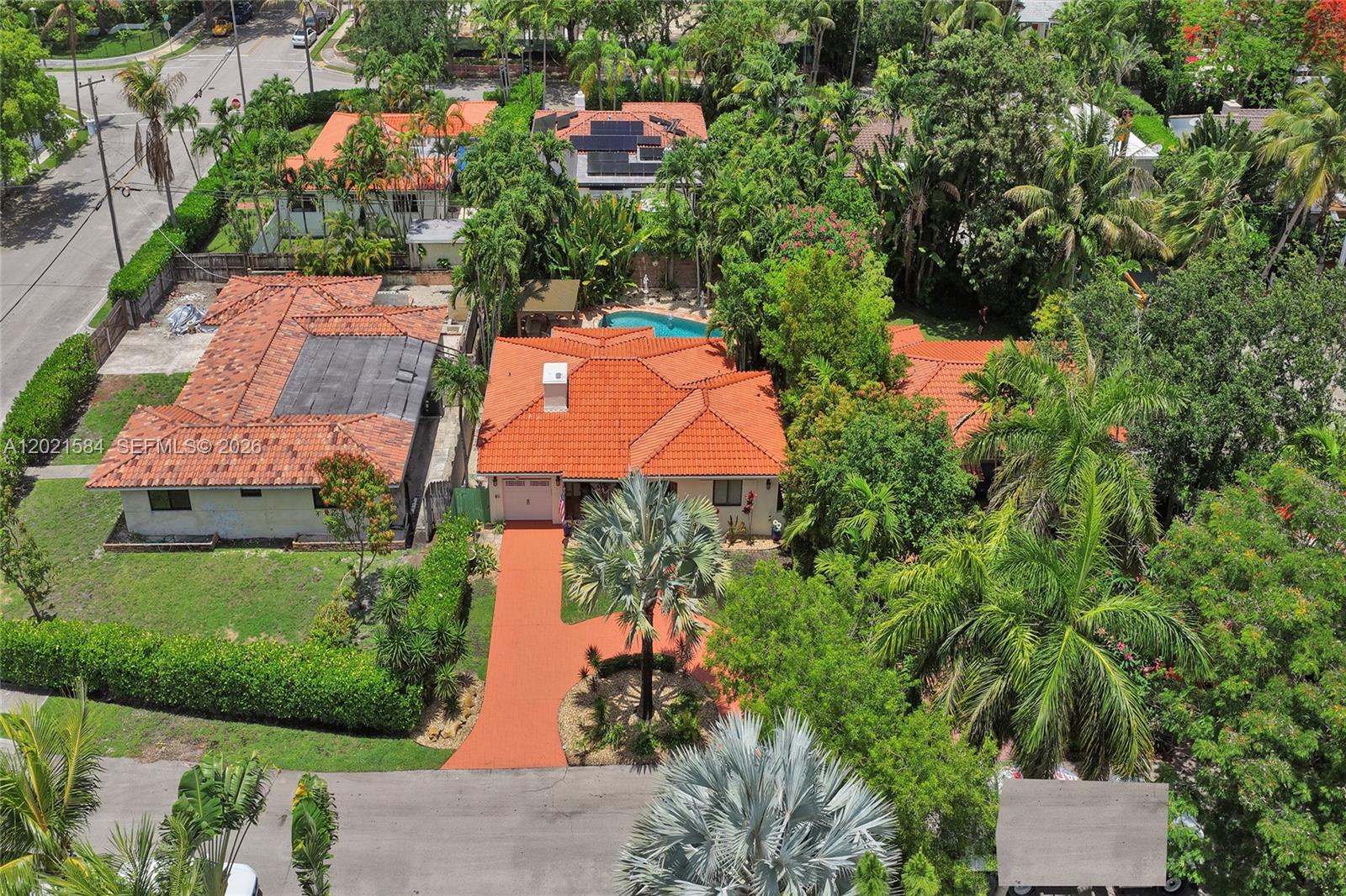 811 Northeast 73rd Street Miami, FL 33138 - Photo 42 of 51 an aerial view of residential houses with outdoor space and street view