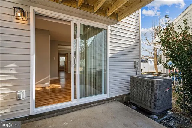 a kitchen with a stove top oven a sink and a microwave