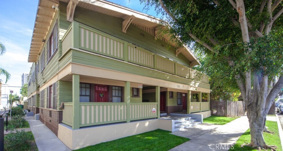 718 Chestnut Avenue, Unit 4 Long Beach, CA 90813 - Photo 11 of 11 a view of a house with a yard and large tree