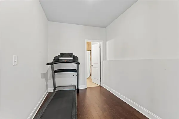 a view of a livingroom with wooden floor
