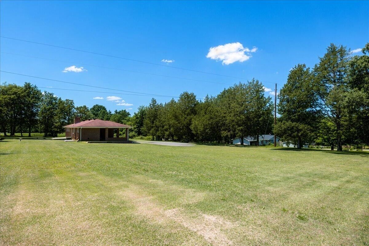 858 Main Street Decatur, TN 37322 - Photo 53 of 65 a view of a golf course with a trees