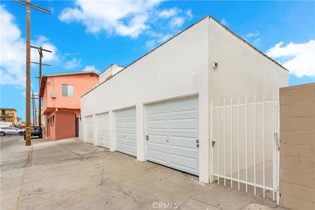 a view of a street with garage