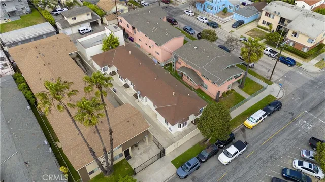 an aerial view of a house with a garden