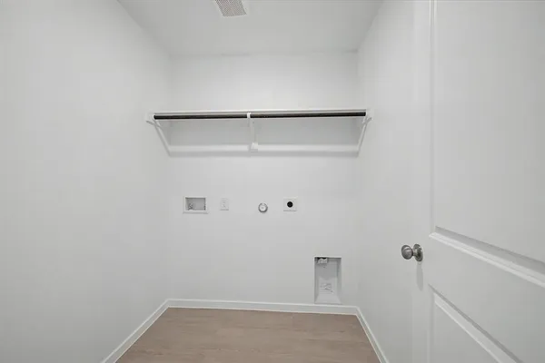 a view of an empty walk in closet