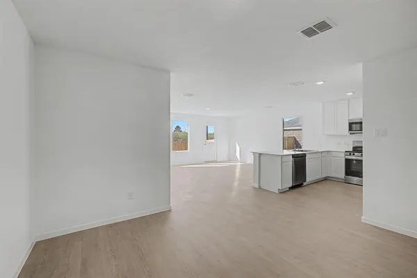 a view of a kitchen with a sink