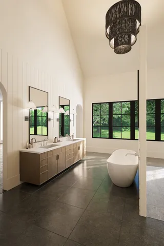 a bathroom with a bathtub and window