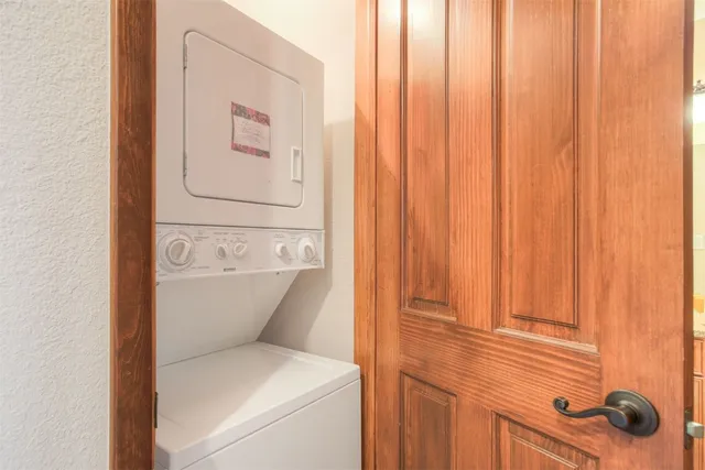 a bathroom with a toilet and shower