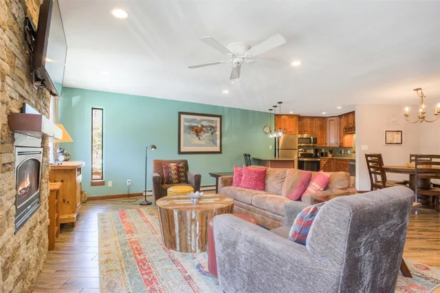 a living room with furniture and a table