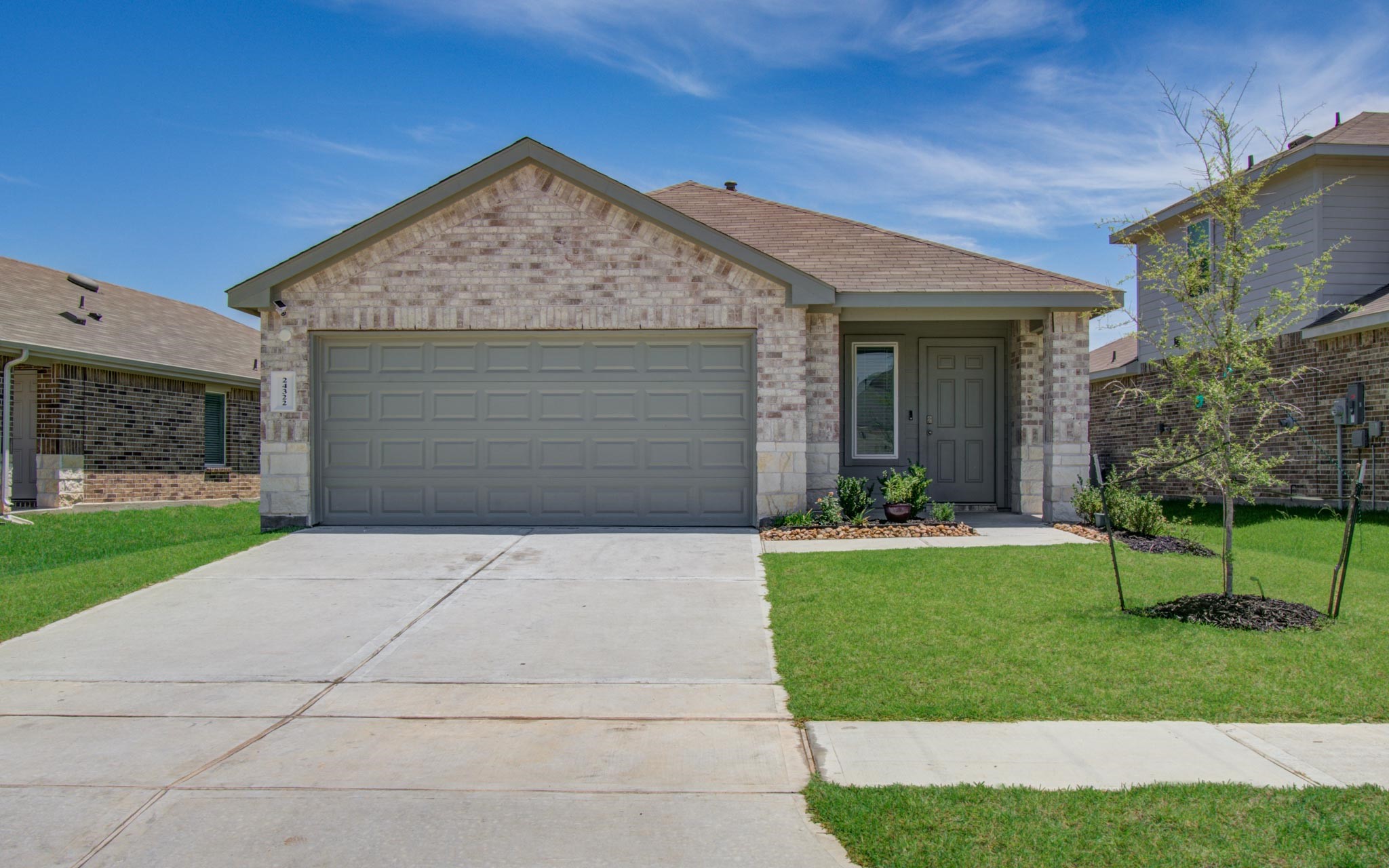24322 Saddlestone Green Drive Spring, TX 77373 - Photo 1 of 22 a front view of house with yard