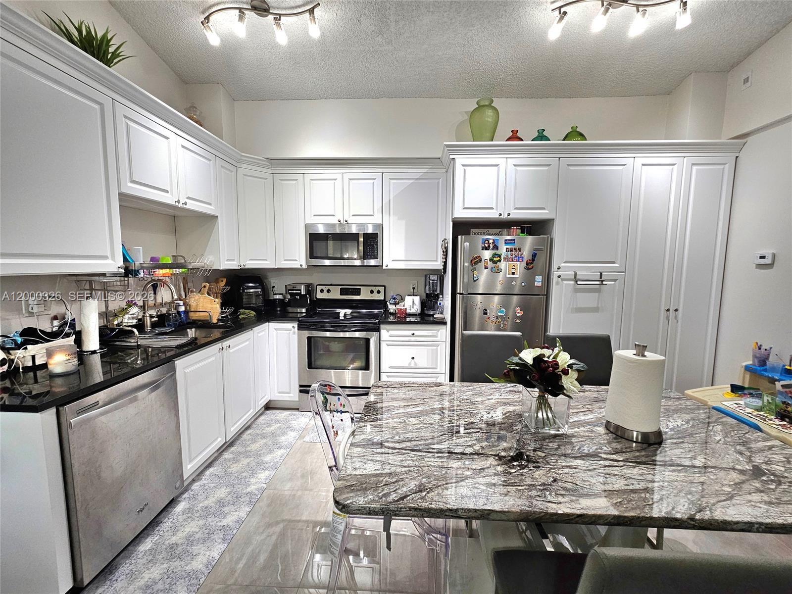 841 Lyons Road, Unit 24205 Coconut Creek, FL 33063 - Photo 2 of 20