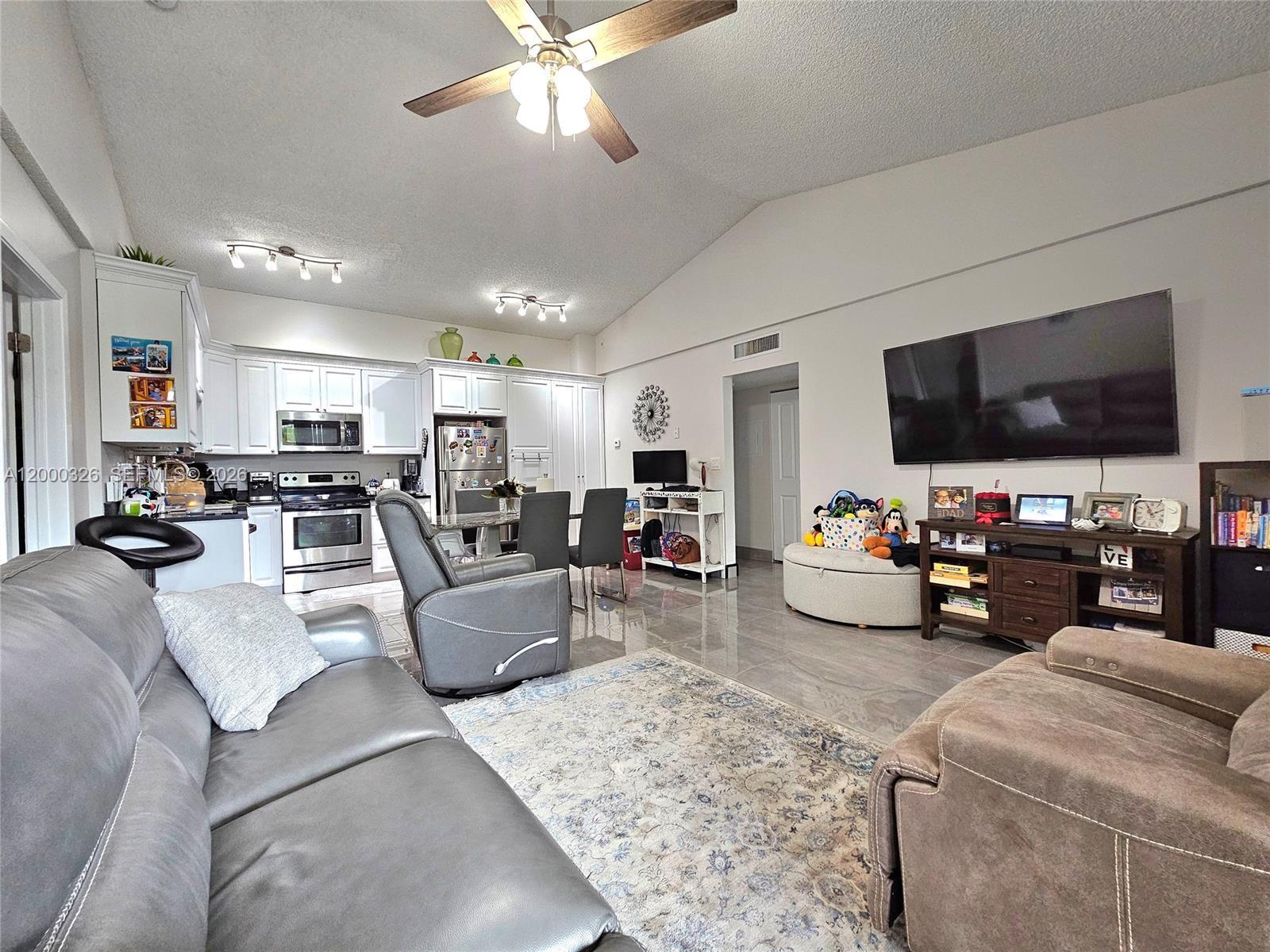 841 Lyons Road, Unit 24205 Coconut Creek, FL 33063 - Photo 3 of 20