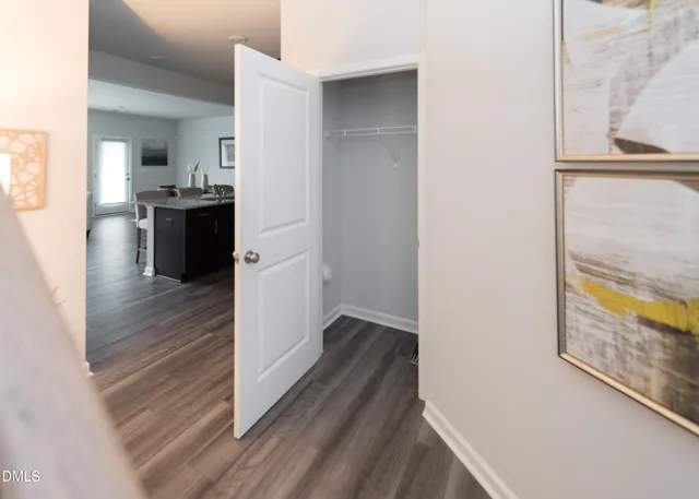 a view of a kitchen from the hallway