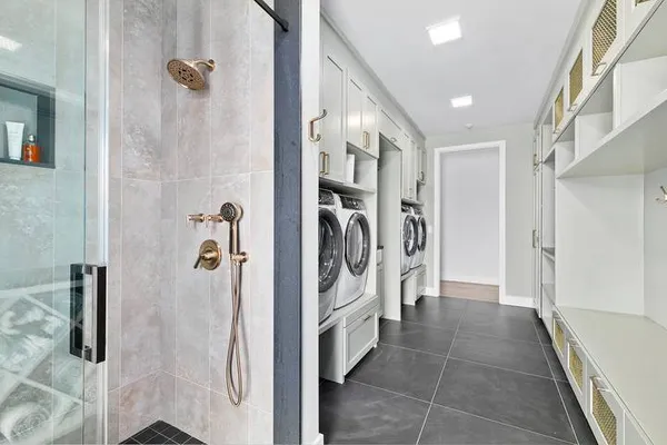 a bedroom with bed and a couch