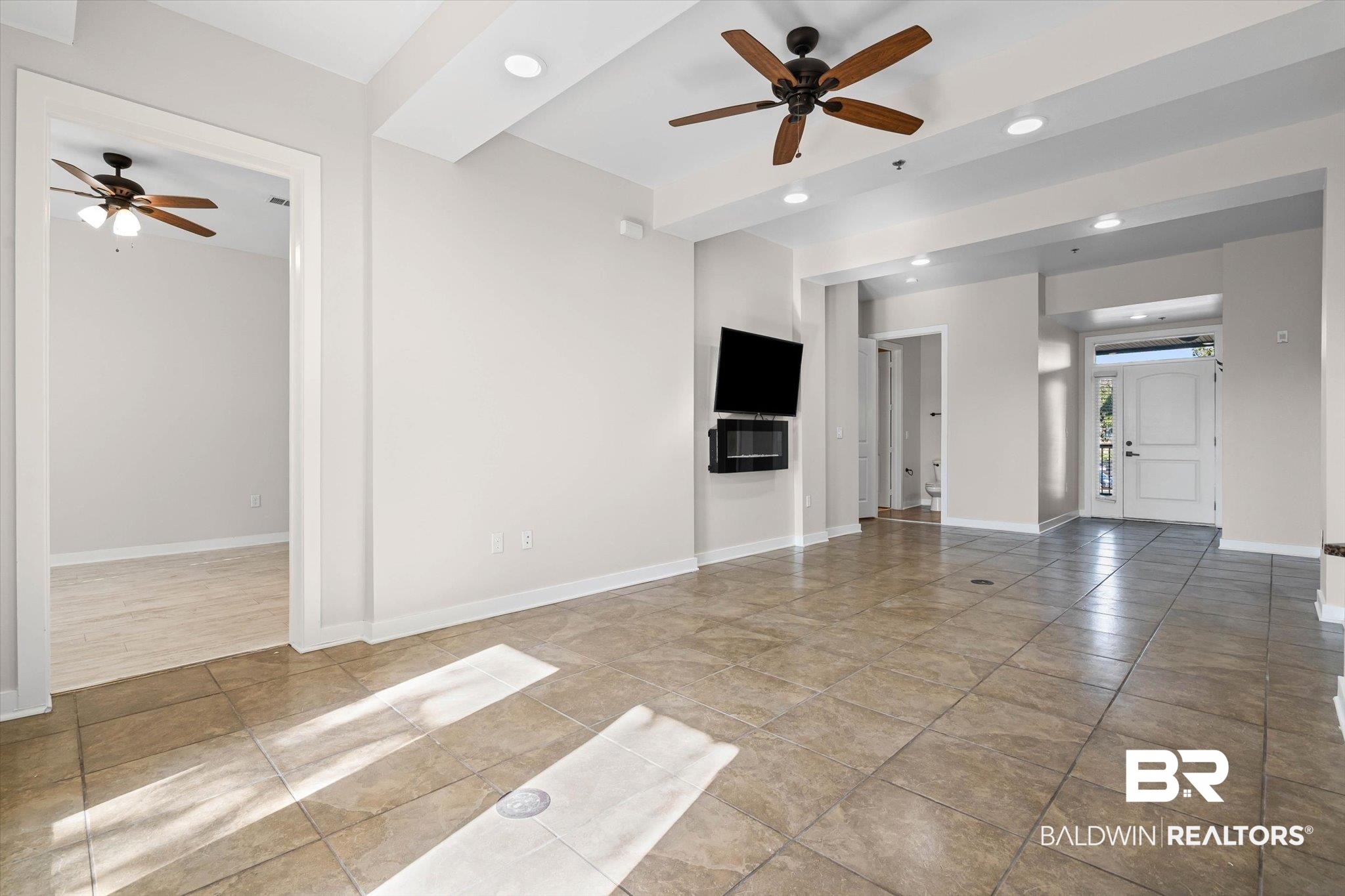 1430 Regency Road, Unit C202 Gulf Shores, AL 36542 - Photo 3 of 27 Large Living Room with Fireplace