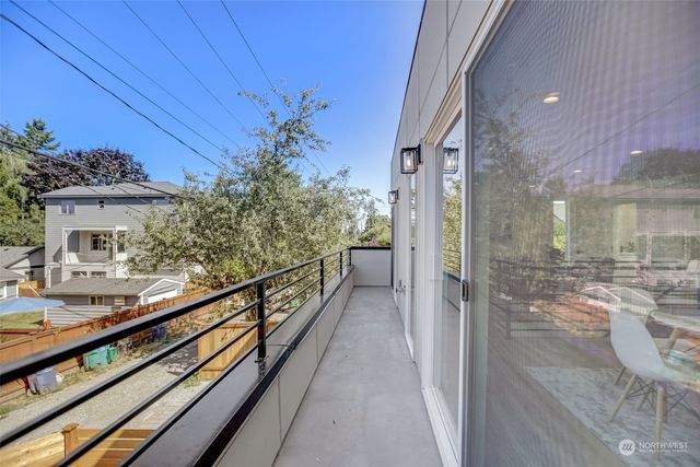 a view of balcony with a potted plant