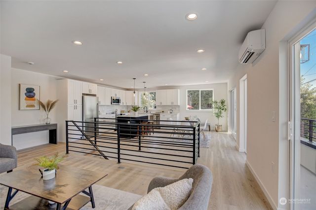 a view of a livingroom with furniture and a table